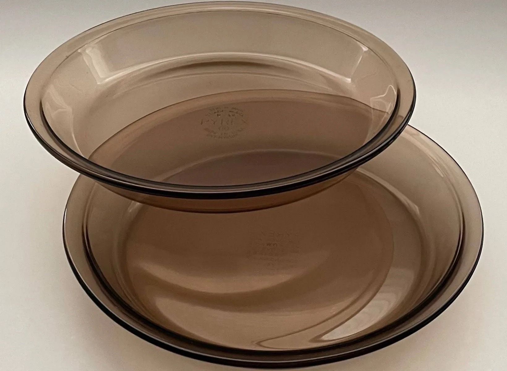2 AMBER COLORED PYREX PIE PLATES