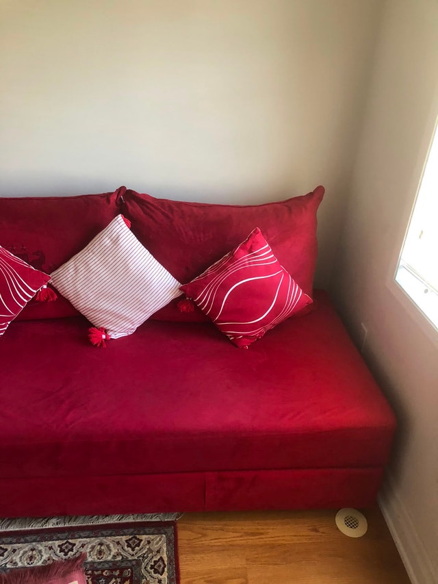 Red Sofa which converts to a bed - photo 2