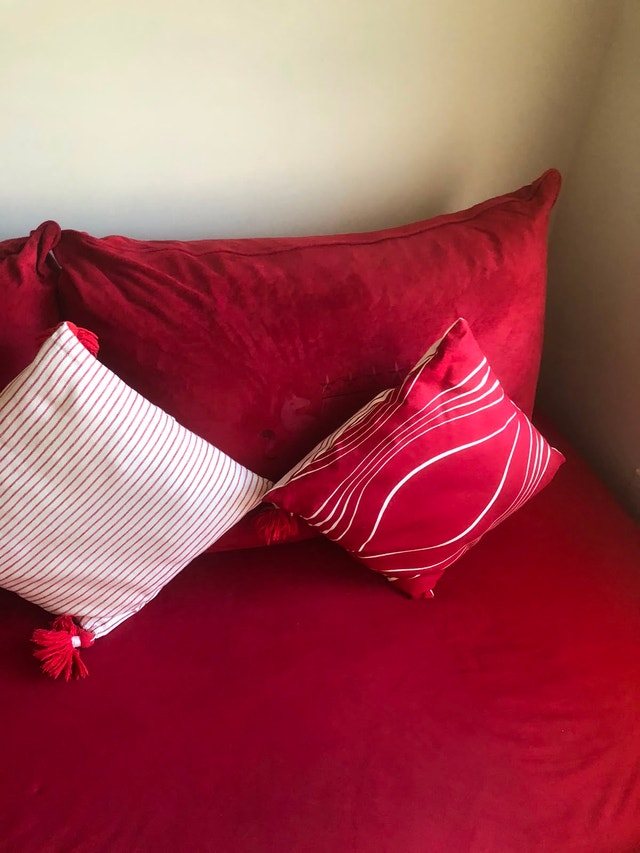 Red Sofa which converts to a bed - photo 4
