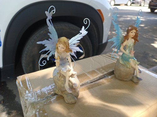 Two Angel Sitting On The Miracle Rocks - photo 2