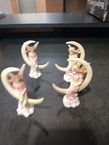 Two Sets Of Four Angel Figurines Item PK388