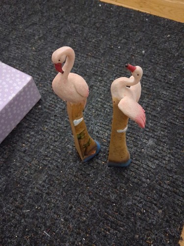 Hand-carved Wooden Flamingo Figurines On Decorative Posts