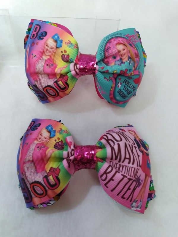 Jojo Siwa, Elmo, Stitch, and Gabby's Dollhouse Hair Bows