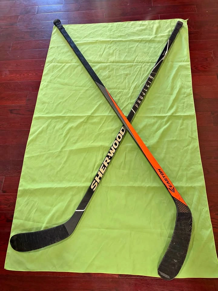2 Hockey Sticks – Sherwood + Easton