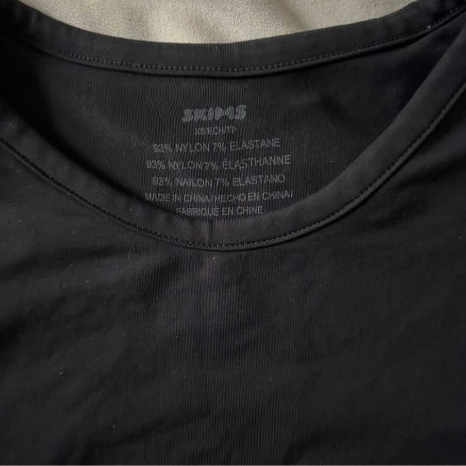Skims Black Soft Smoothing Seamless T-Shirt - photo 3