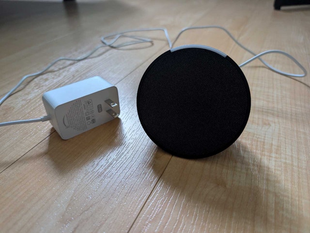 Amazon Echo Pop with plug