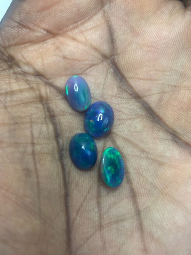 6.59 Carats Natural Welo Black Opal Cabochon Cut