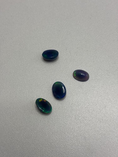6.59 Carats Natural Welo Black Opal Cabochon Cut - photo 3
