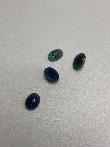 6.59 Carats Natural Welo Black Opal Cabochon Cut - photo 5