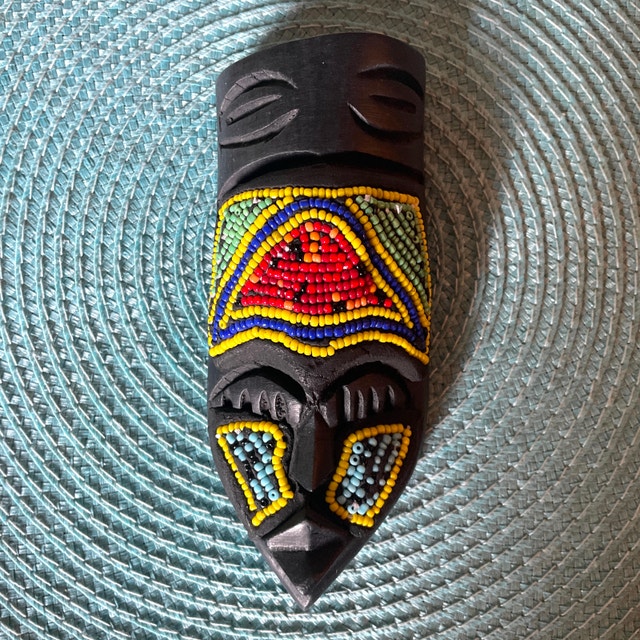 Beaded small wooden mask from Ghana