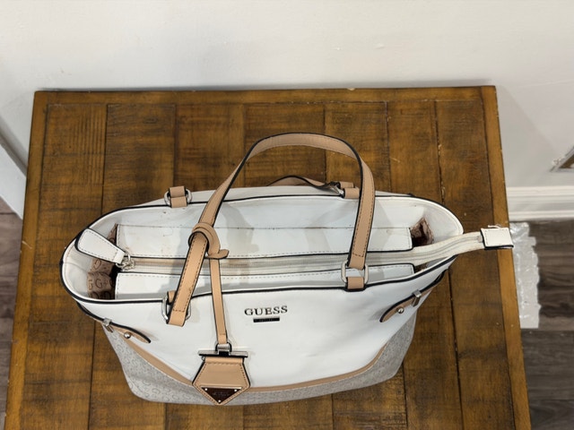 white and beige GUESS tote bag
