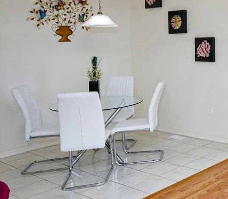 Round Glass Dining Table with leather chairs for sale