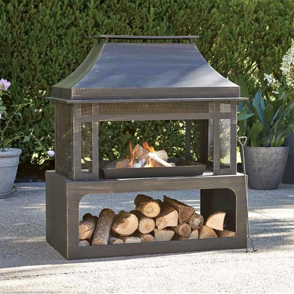 Brand new Steel Outdoor Fireplace. In a box