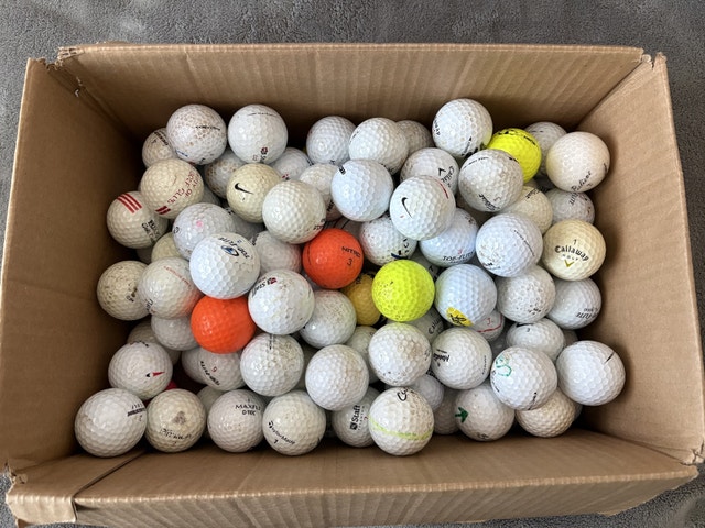 100 used golf balls good for practice or the cottage