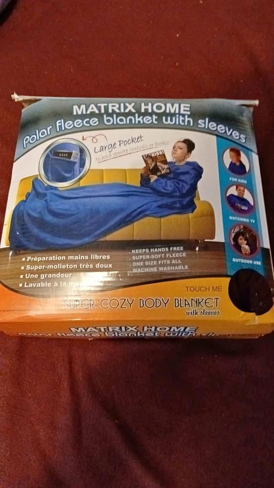 Blanket with sleeves