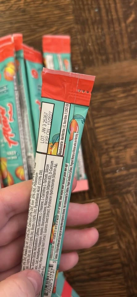 Alani peach powder drink exp Dec 2027 - photo 3