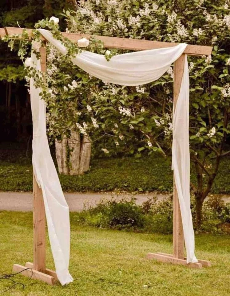 Event Decor: Arch, Drapes, Lights, and Flowers