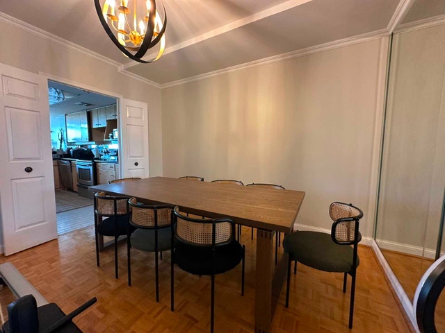 Modern Wood Dining Table with 8 Cane Back Chairs