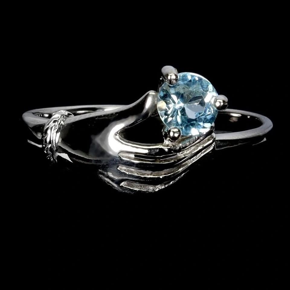 Claddagh Sky Blue Topaz Hand Ring 14K White Plated Size 7 - photo 2