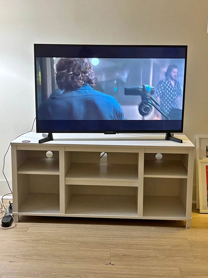White TV stand with shelves