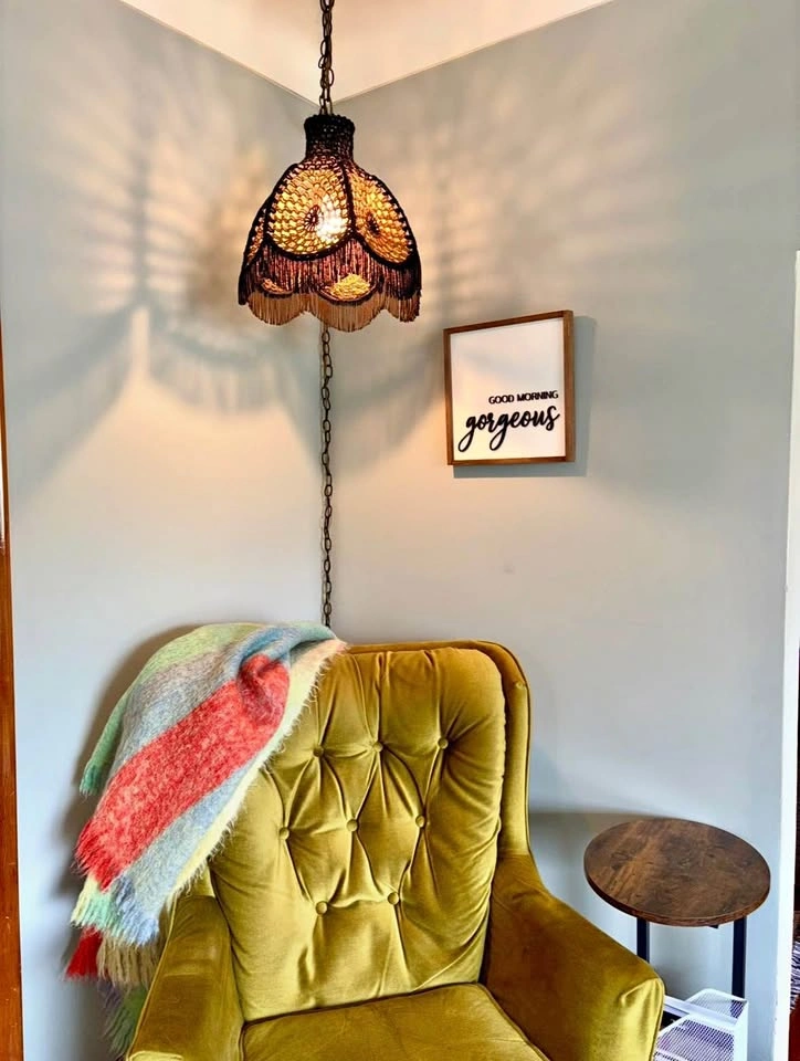 Green Velvet Chair & Antique Hanging Light