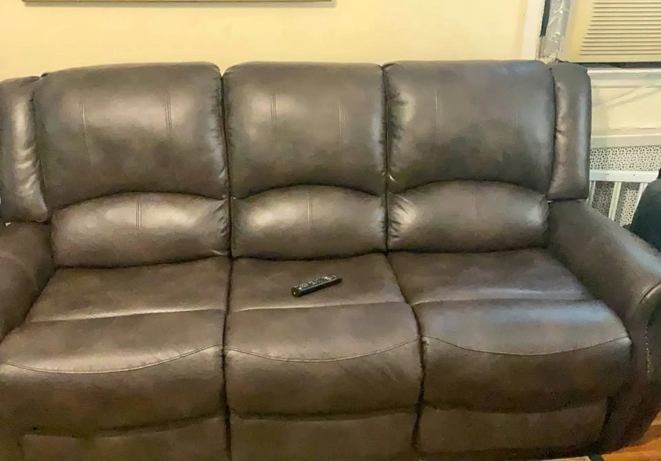 Dark Brown Reclining Sofa with Nailhead Trim