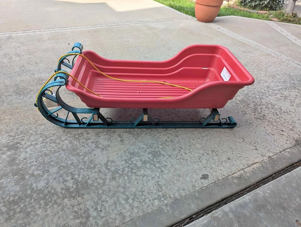 Red and Green Plastic Pull Sled