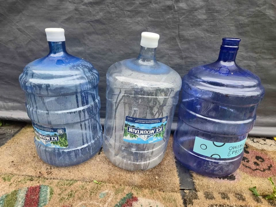 3 five gallon water bottles