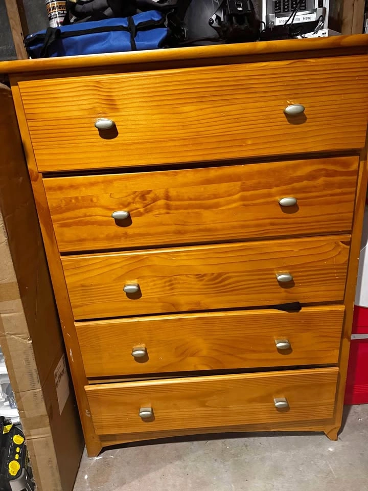 Dresser. 5 drawers. Wood. Not brand new.