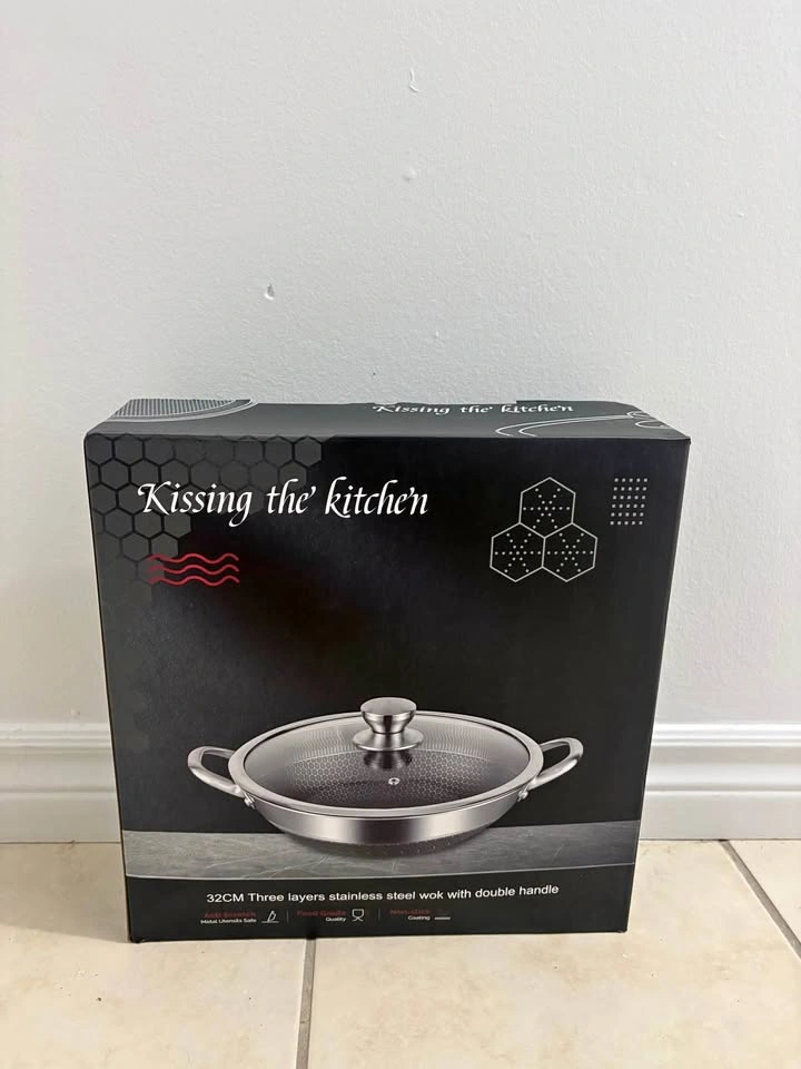 Kissing the Kitchen Wok