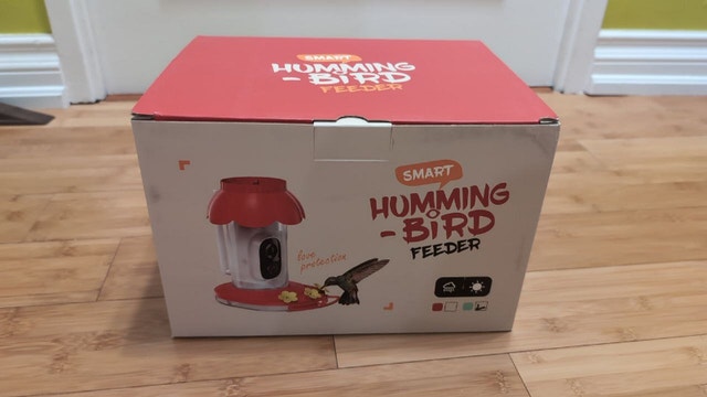 New, never used Hummingbird Feeder with Camera, identifies birds