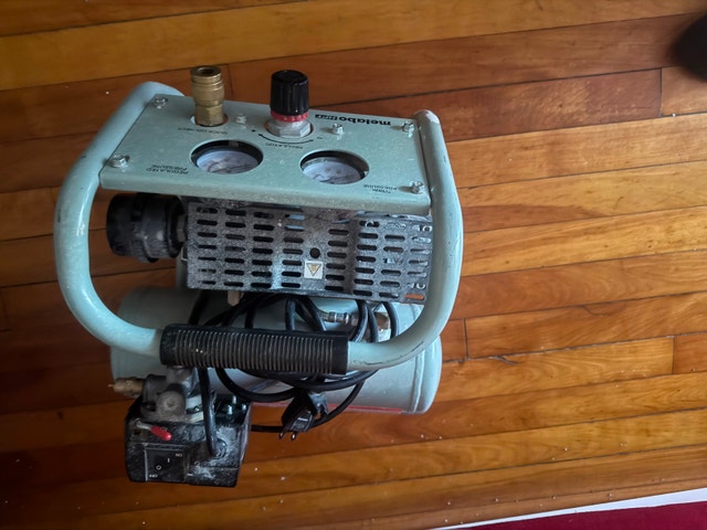 compressor with hose and a pneumatic staple - photo 2