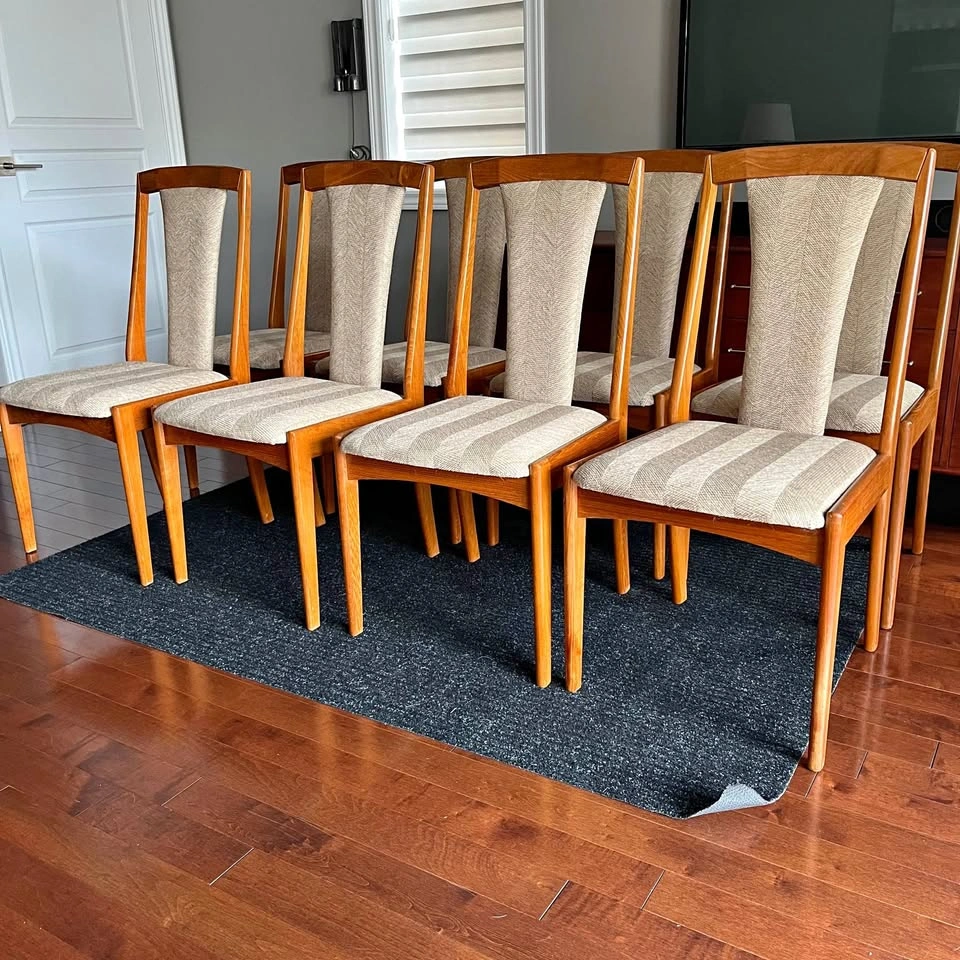 8 Mid-Century Modern Teak Dining Chairs by Nordic Furniture