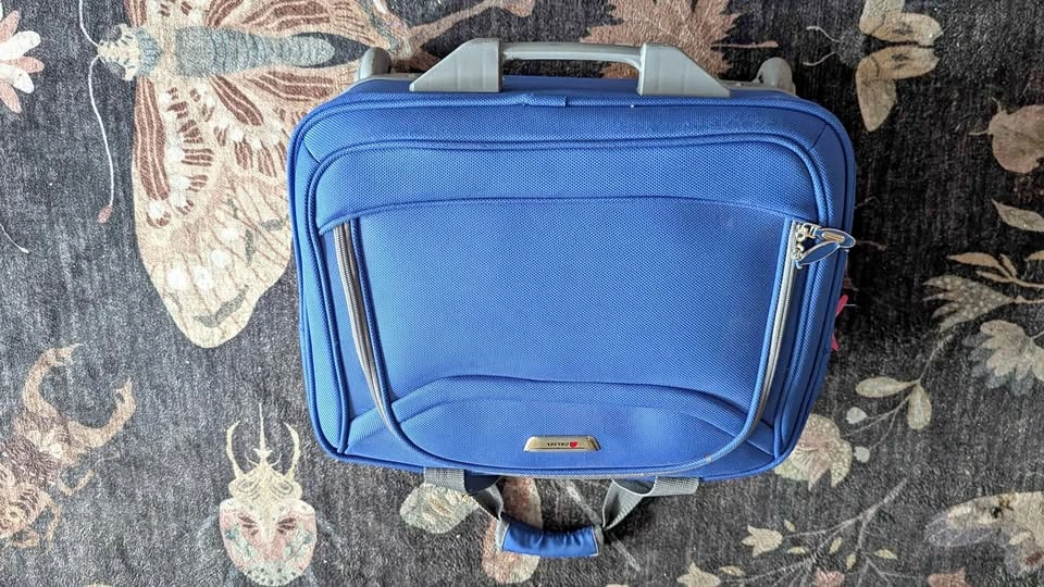 Delsey Blue Rolling Underseat Bag