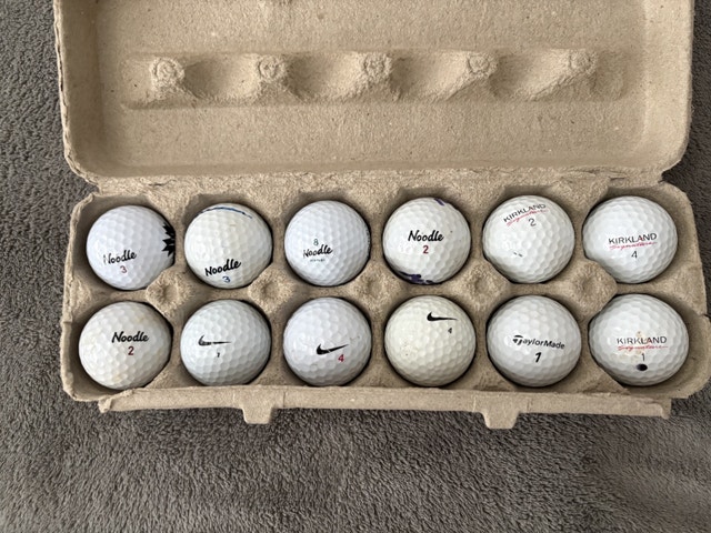 12 assorted golf balls Nike Noodle Kirkland