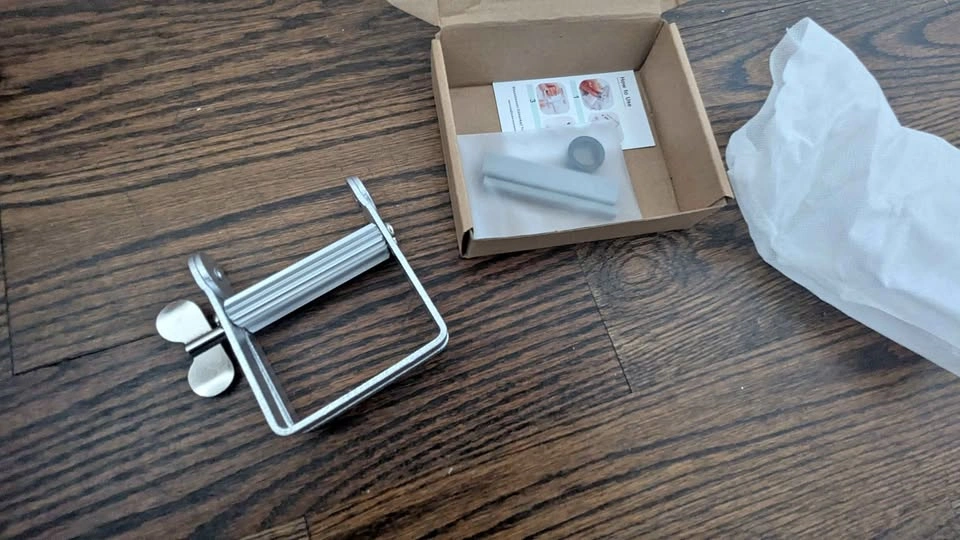 Toothpaste tube squeezer