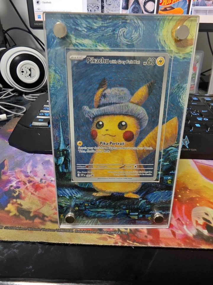 Pokemon pikachu with grey felt hat