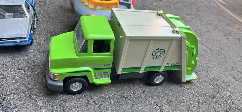 Imaginext Shark Bite Pirate Ship, Playmobil DeLorean, and Truck