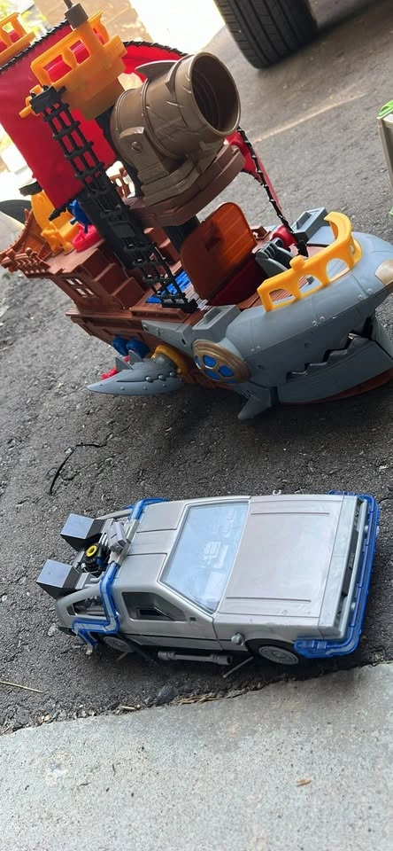 Imaginext Shark Bite Pirate Ship, Playmobil DeLorean, and Truck - photo 3