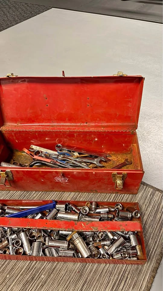Red Metal Toolbox with Large Socket and Wrench Set