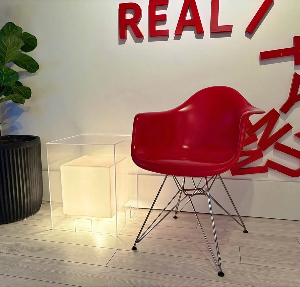 RED EAMES STYLE PLASTIC MOLDED ARMCHAIR!