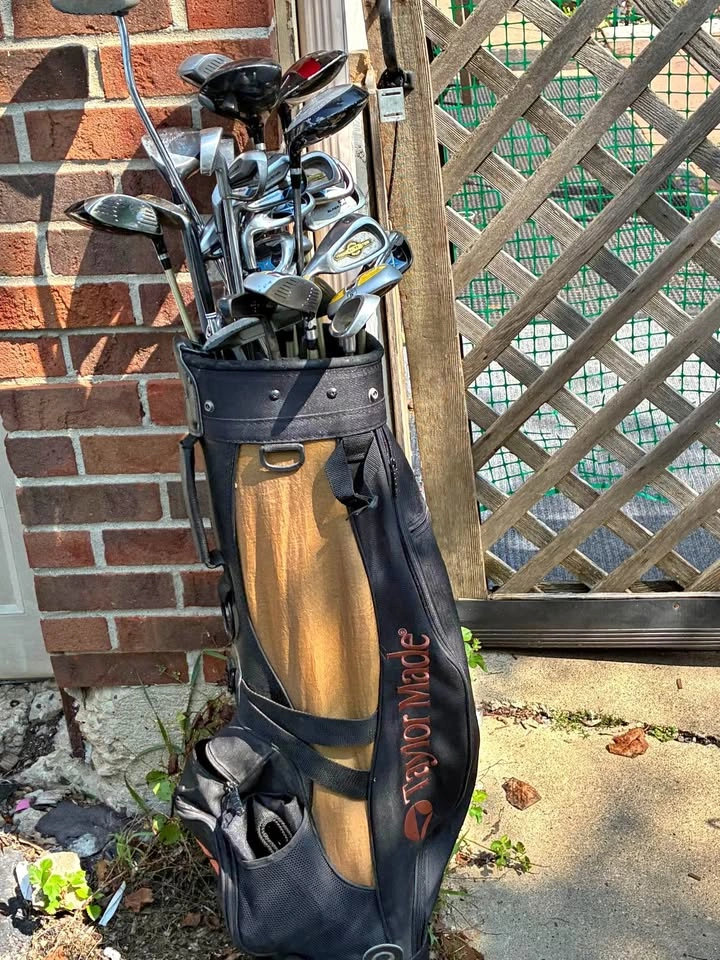 Vintage Taylor Made golf bag with left handed golf clubs