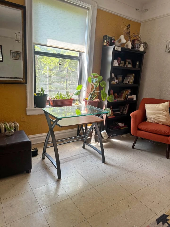 Compact Glass-Top Metal Table with Lower Shelf