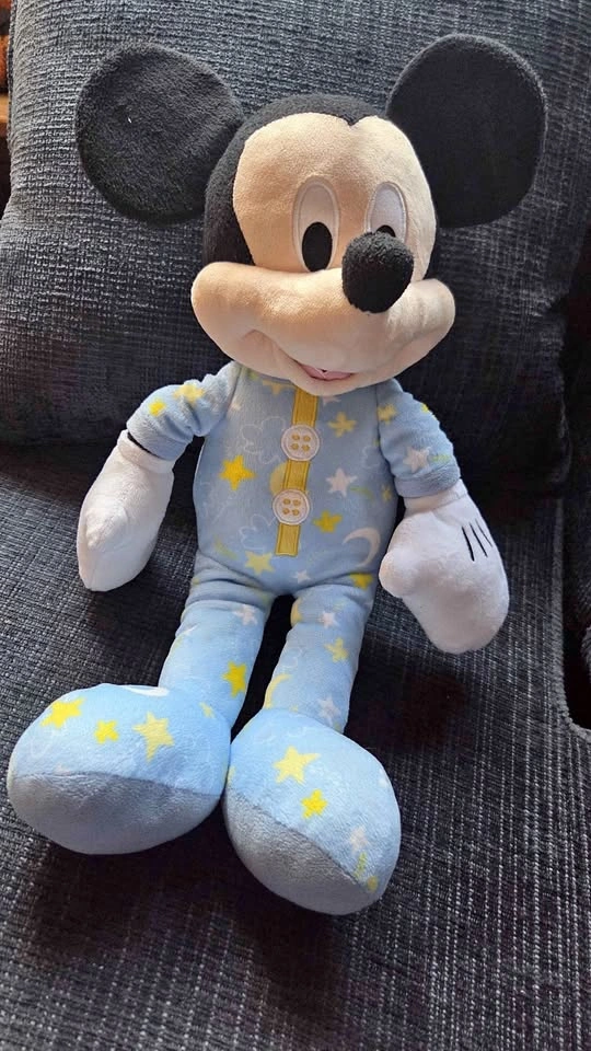 Mickey mouse plush wearing pajamas