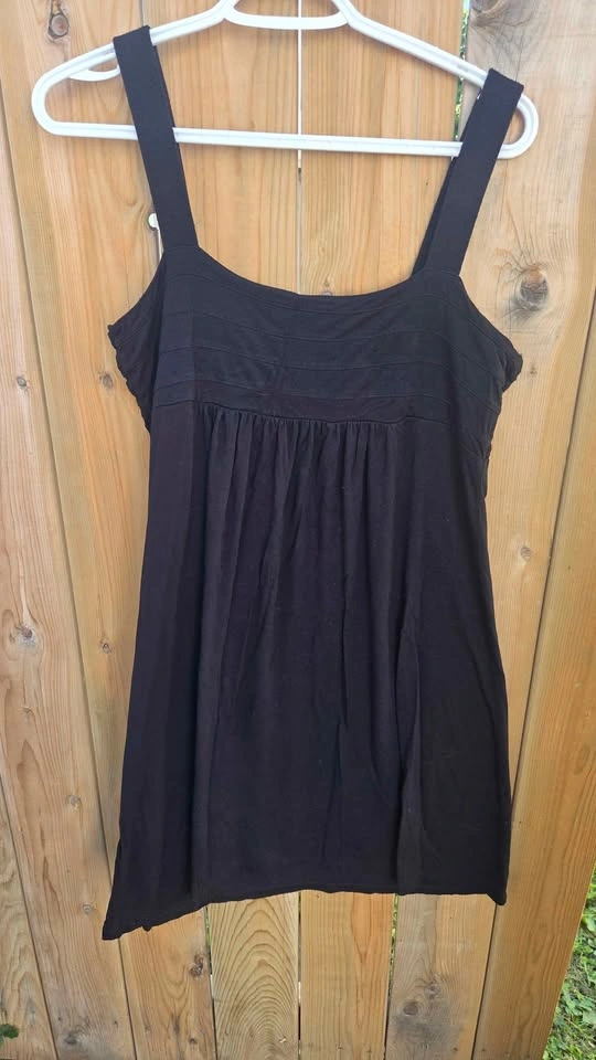 black babydoll mini dress features a smocked bodice and thick st - photo 3