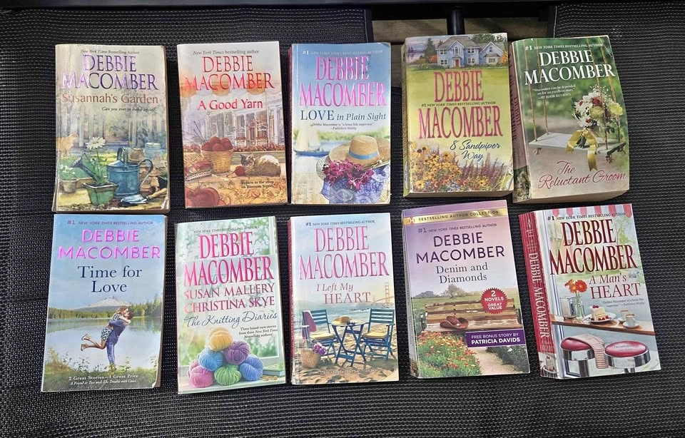 ten paperback romance novels authored by Debbie Macomber