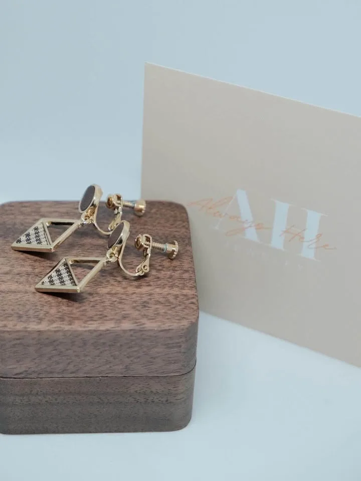 Brown textured geometric drop earrings image indicator(3)