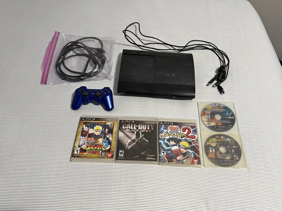 Sony PlayStation 3 PS3 console with controller and games