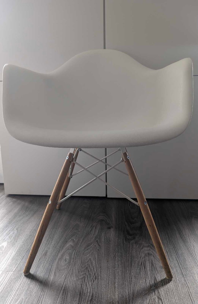 2 Herman Miller Eames Molded Plastic Armchairs