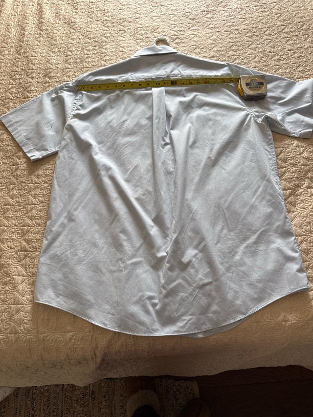 blue short sleeved shirt - photo 3